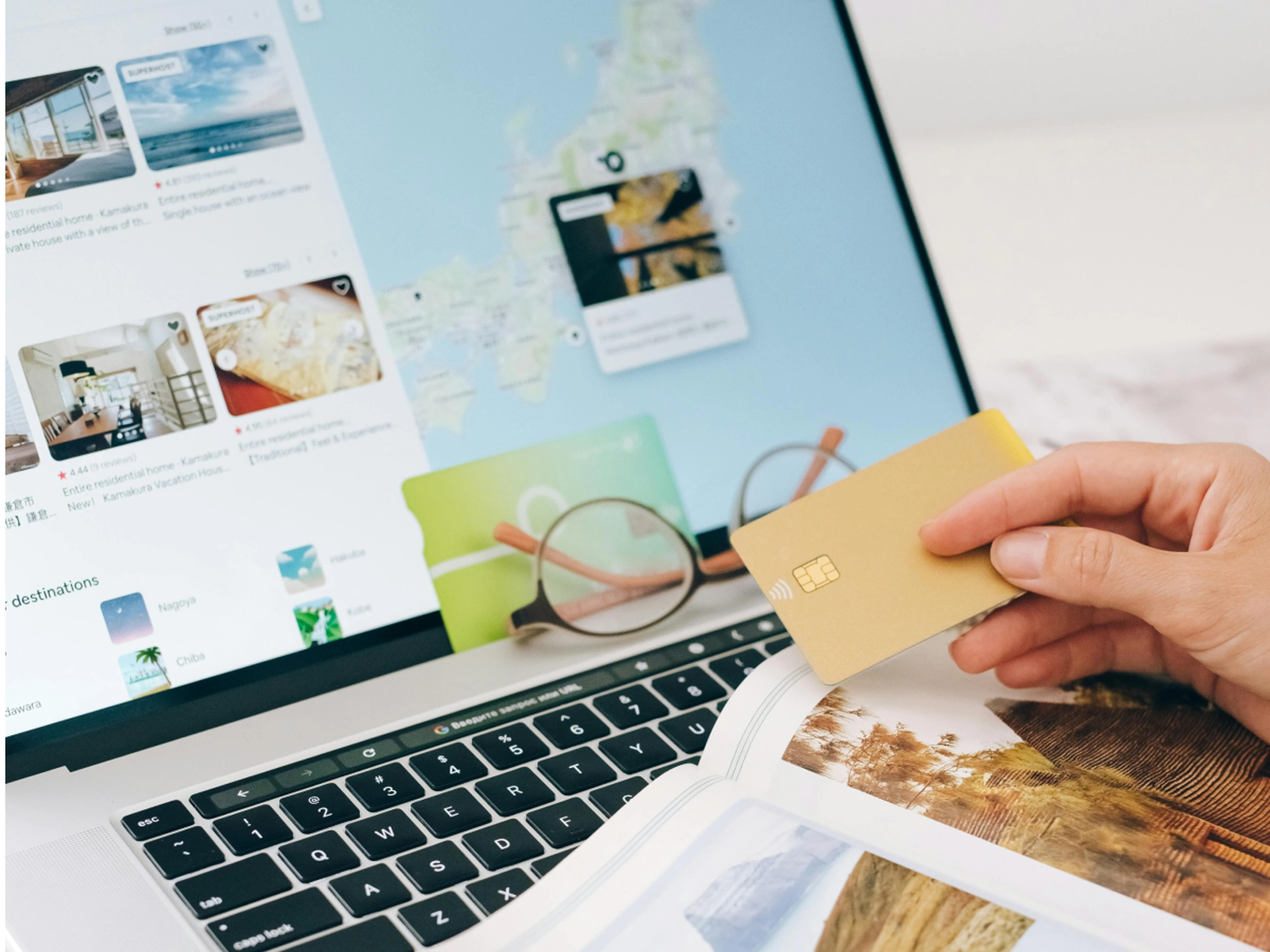Laptop displaying a map and accommodations on Airbnb