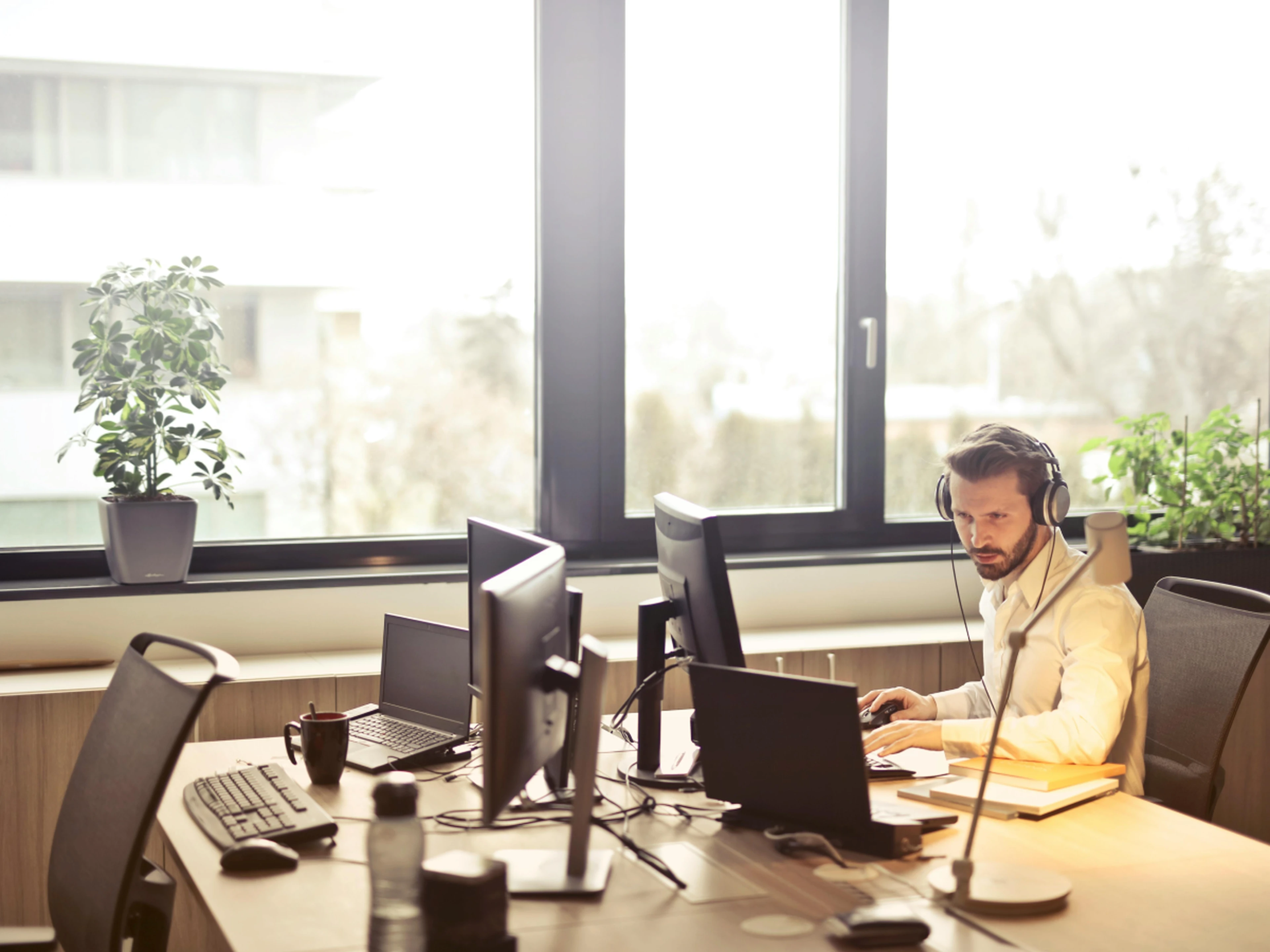 Customer support at desk calling customers