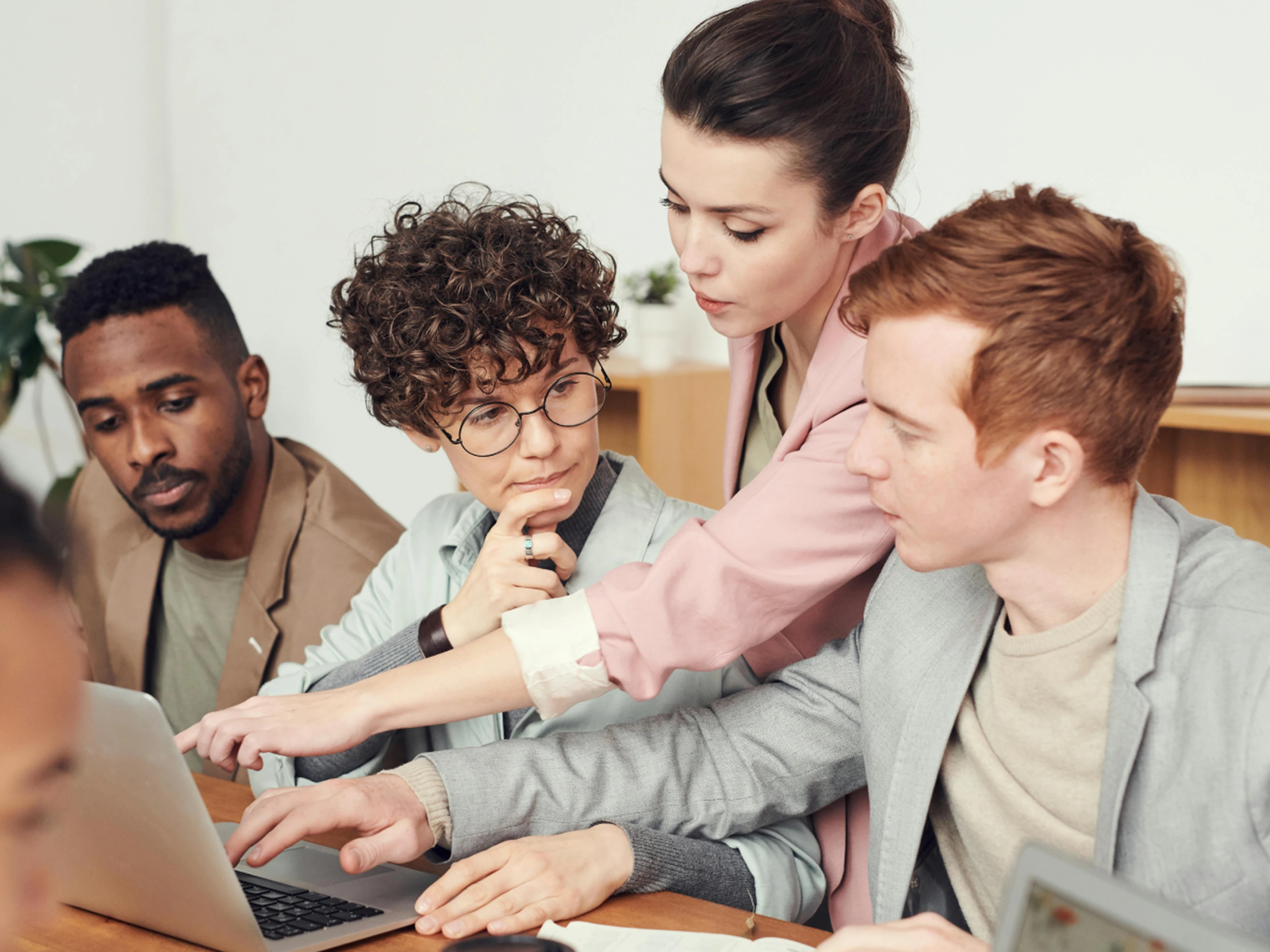 People collaborating during a work meeting