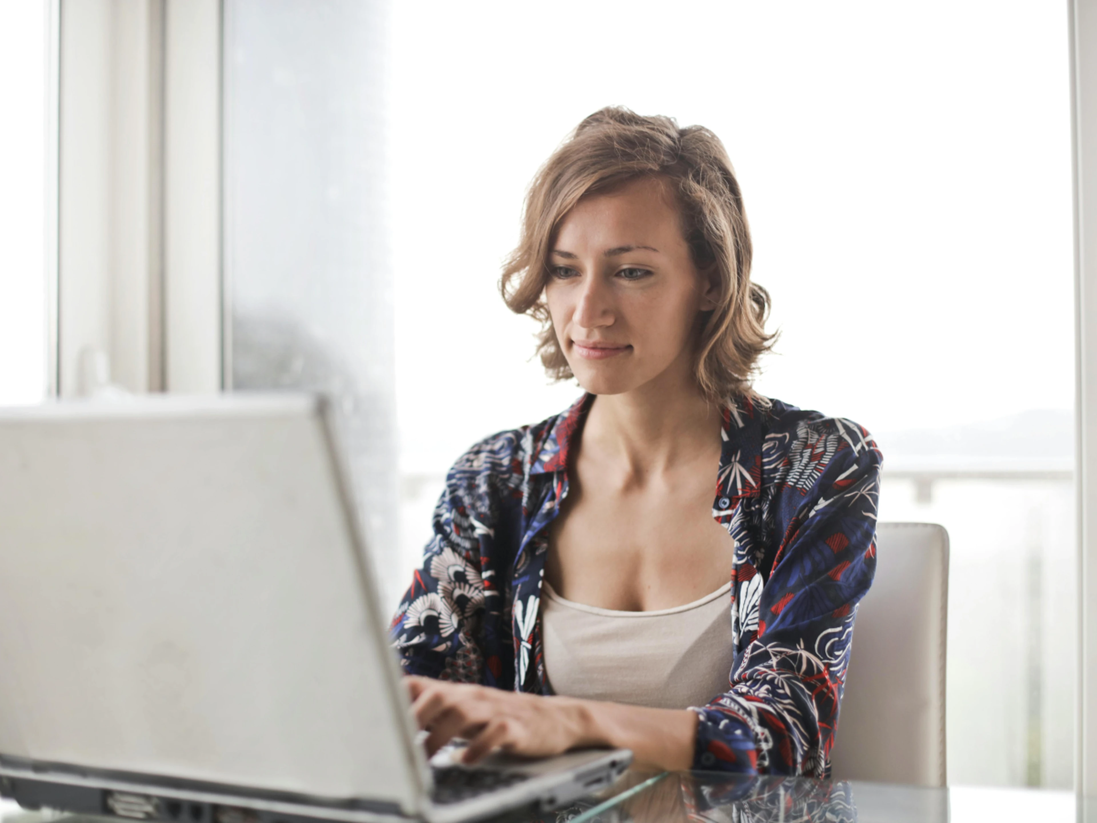 Woman working on a laptop