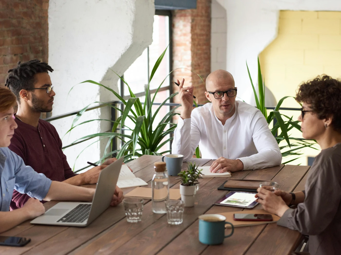 People meeting at a big table