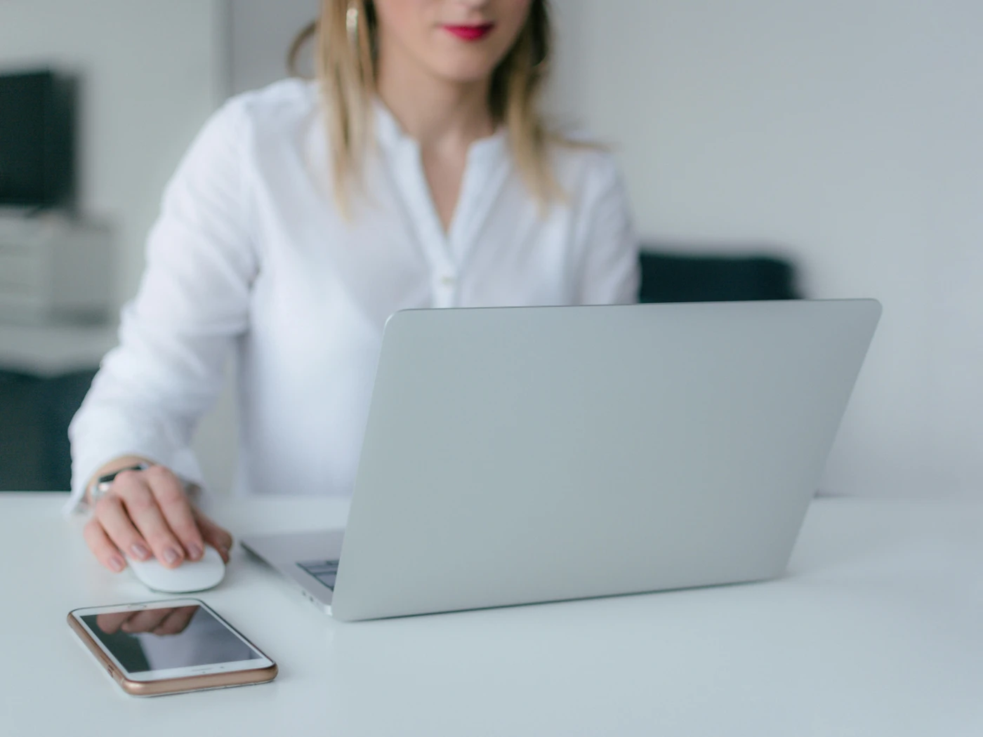 woman behind a laptop working
