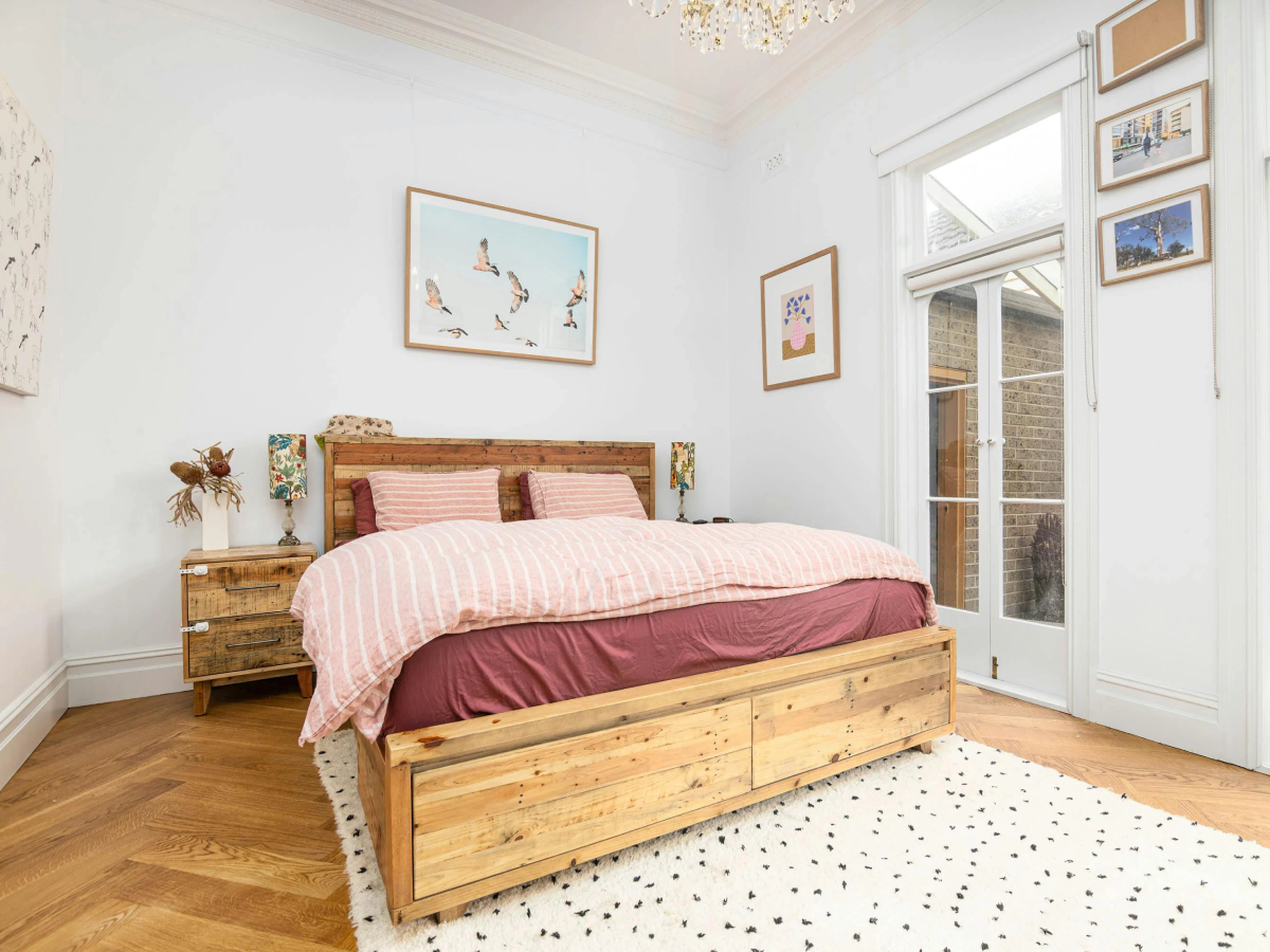 Cozy and authentic-feeling hotel room with nicely decorated walls