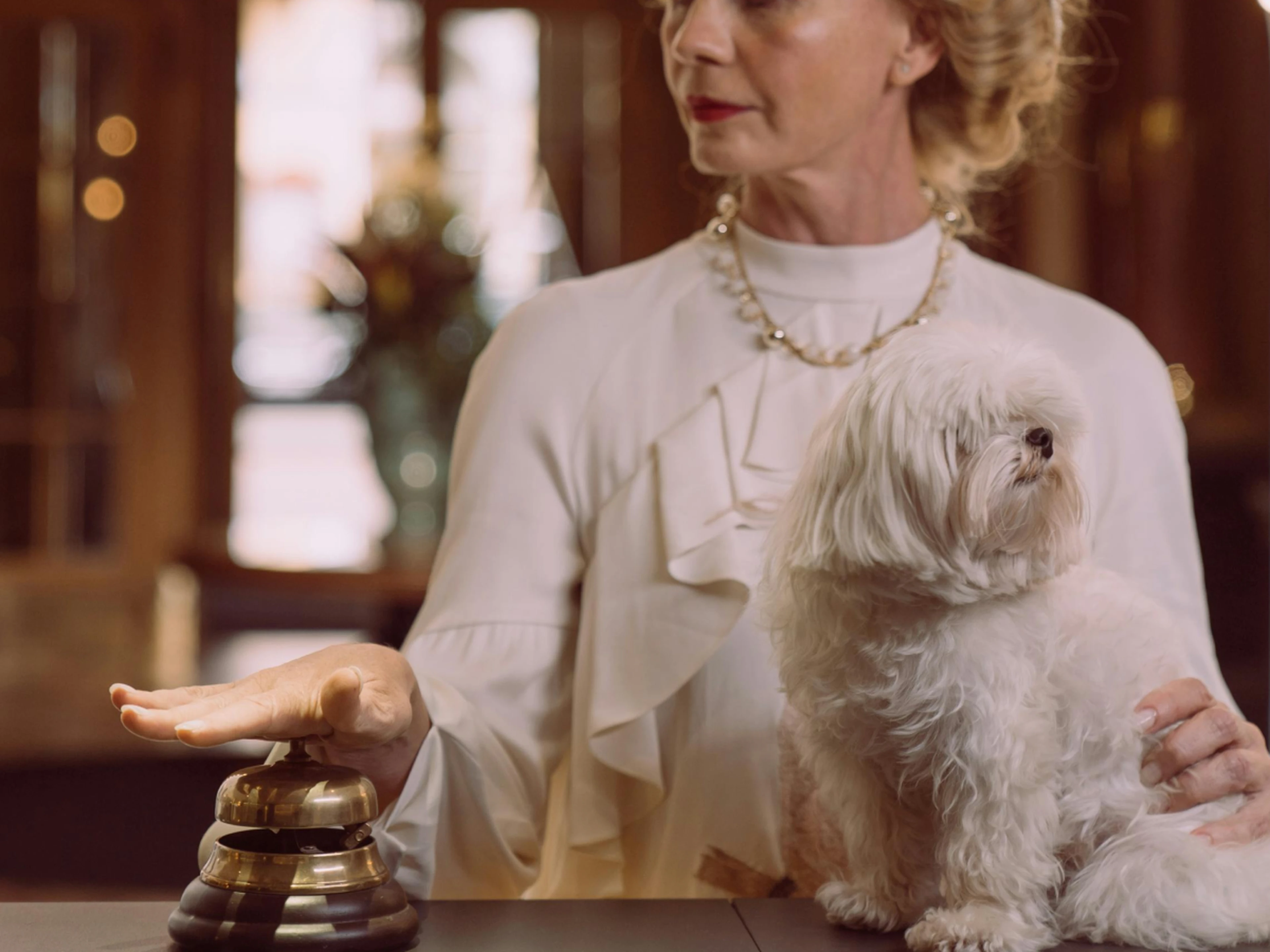 hotel guest waiting at the front desk