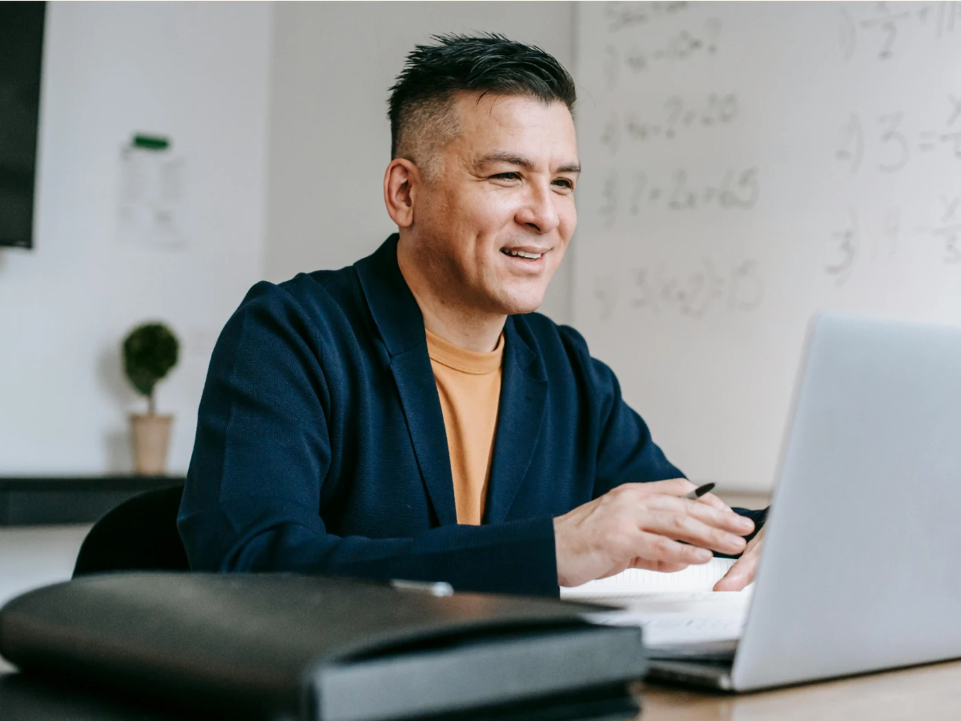 hotel owner using Lighthouse on his laptop