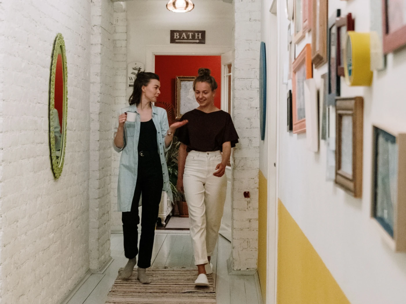 boutique hotel guests walking through a hallway