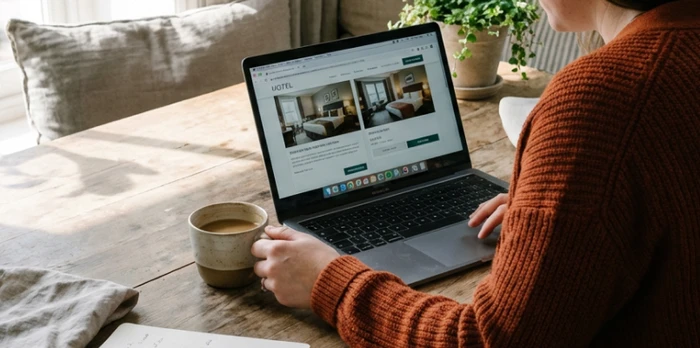 hotelier managing guest reviews on their hotel website