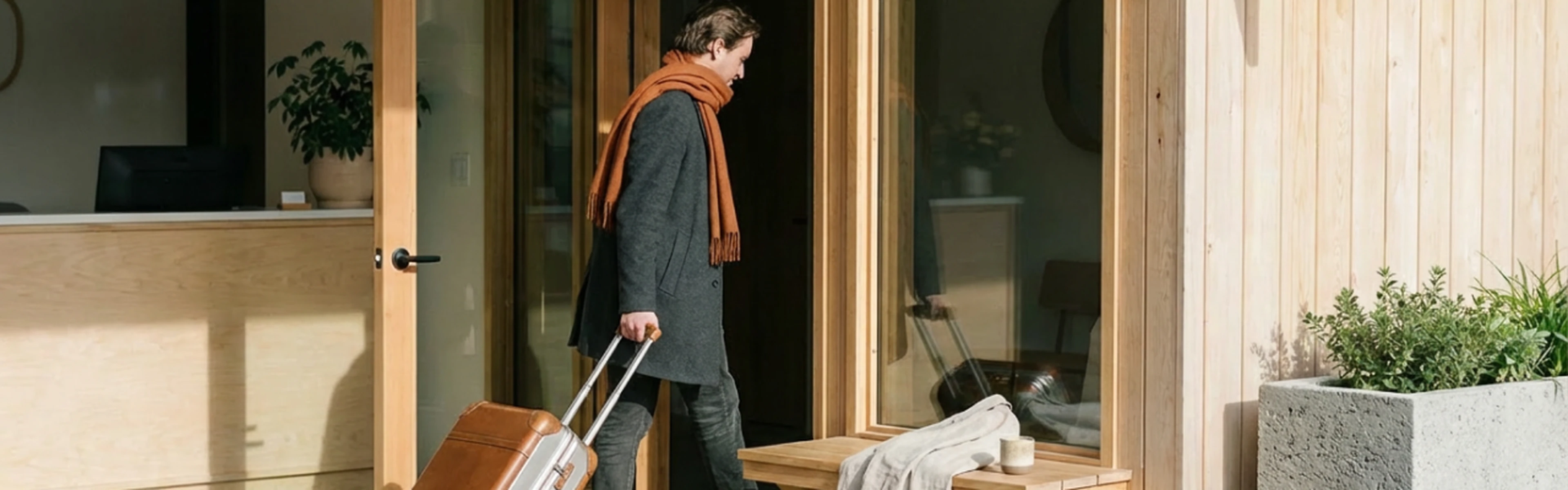 Guest walking into an independent hotel to check-in