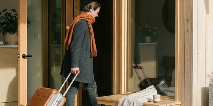 Guest walking into an independent hotel to check-in