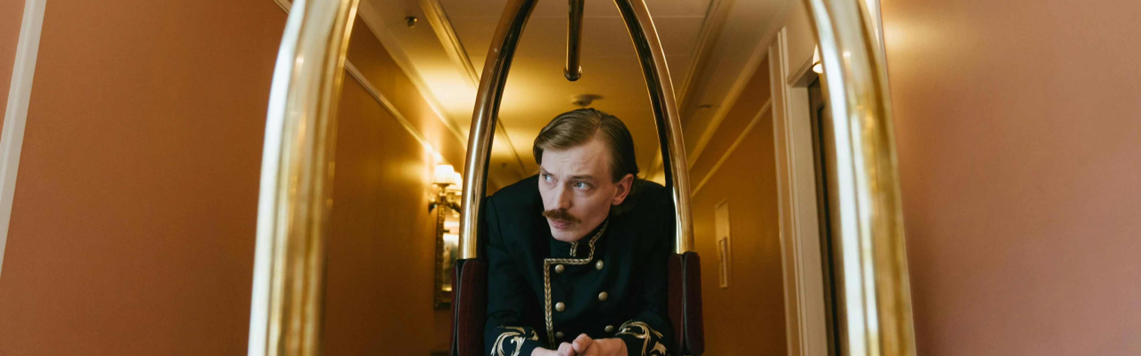 Hotel porter carrying luggage