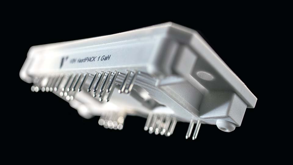 Close-up of a fastPACK1GaN power module on black background