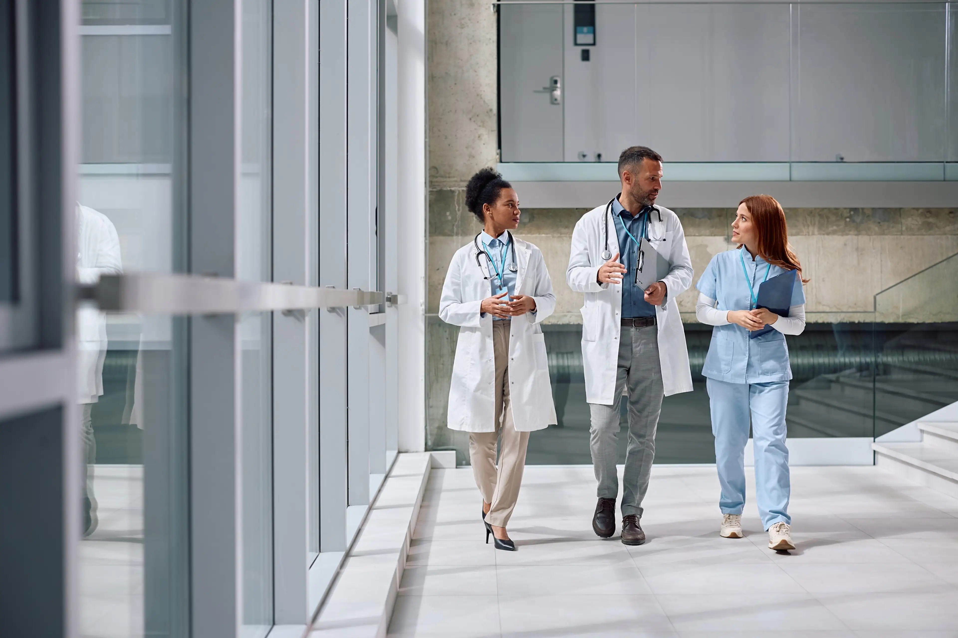 Medical team walking through a hospital