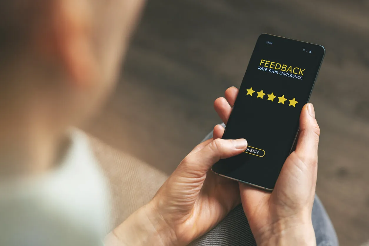 customer leaving 5 star review on phone