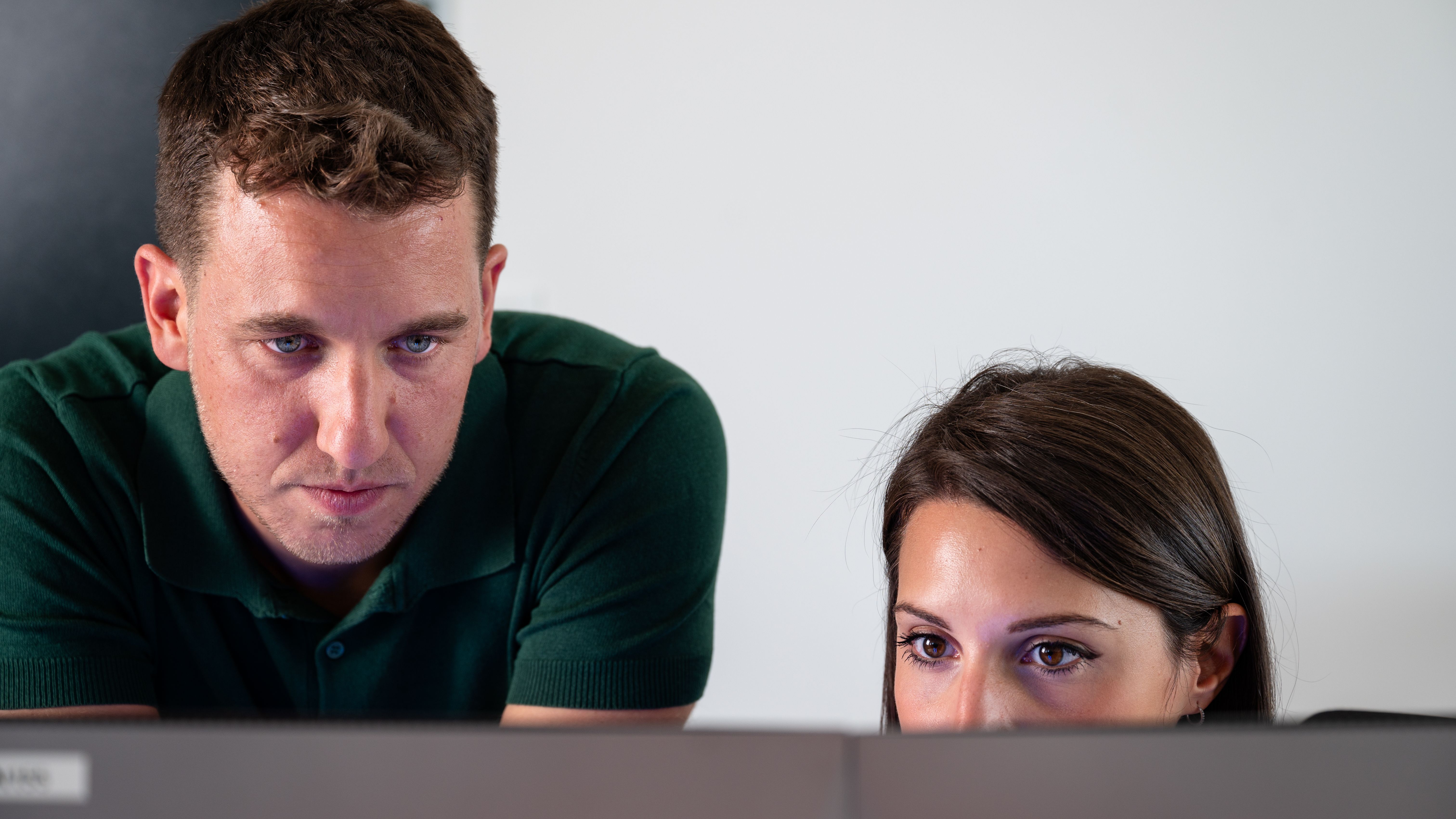 People looking at computer