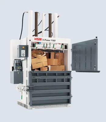 To fill the press, the upper half of the doors is swung to the right