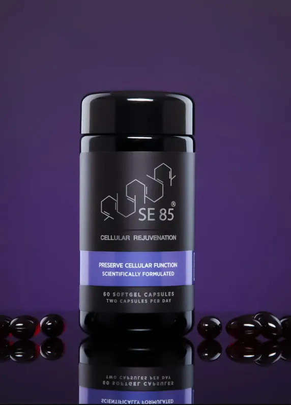 Black SE85 cellular rejuvenation Miron Jar with purple label on a purple backdrop, surrounded by scattered gel capsules.