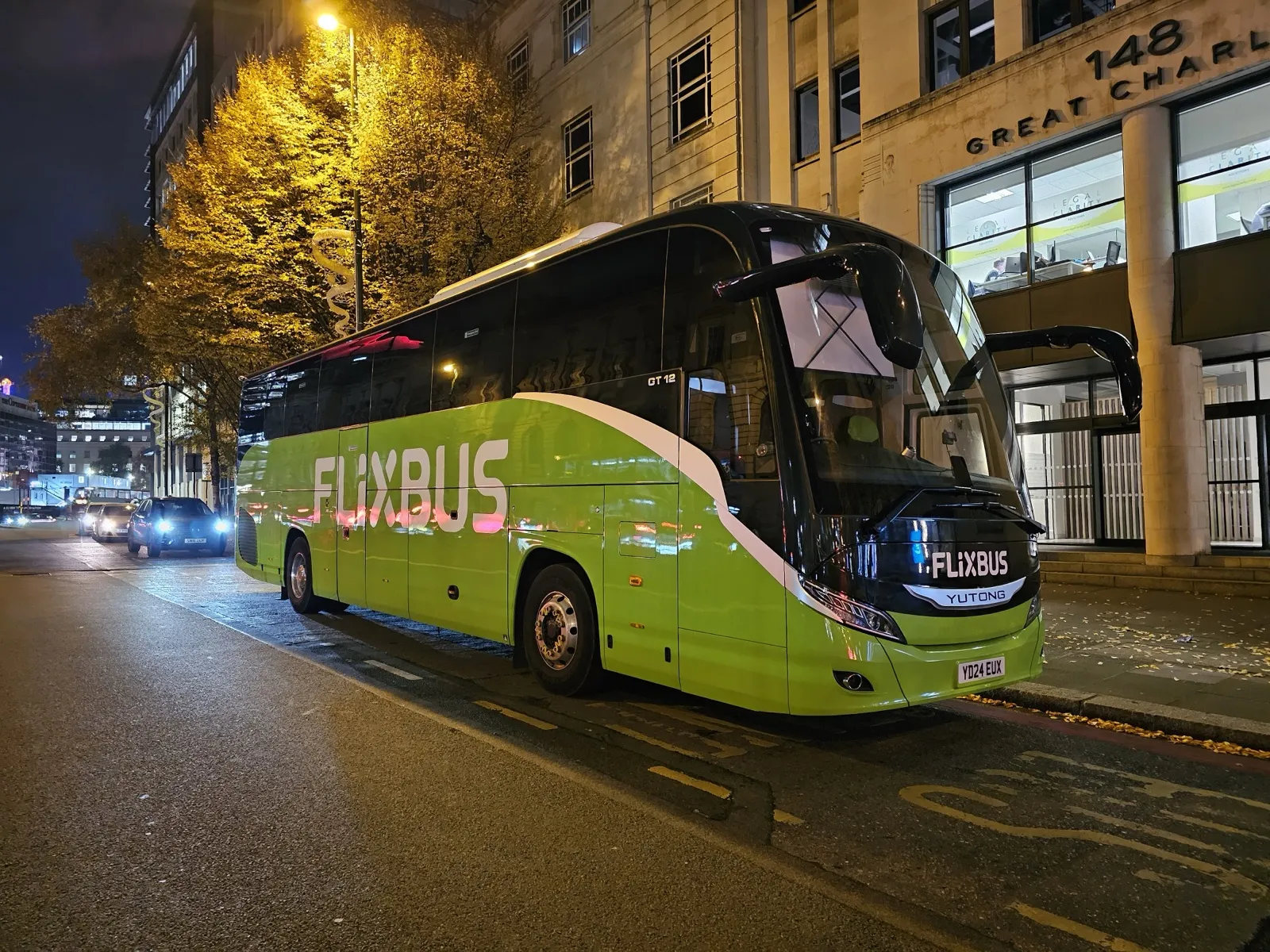FlixBus Yutong coach parked on a city street at night