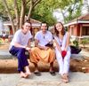 Three young participants experiencing the profound stillness of a Madhukar Enlighten Life silent ashram retreat in India, diving into the roots of Advaita.