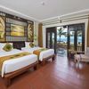 https://a.storyblok.com/f/289146571662634/678x452/61c388296e/bedroom-vietnam-beach-resort.jpeg