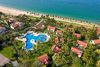 A bird’s-eye view of the serene Palm Garden Resort: where turquoise pools meet private bungalows and the endless shores of Cua Dai – the sanctuary for your Madhukar Yoga of Silence retreat in Vietnam.Cool! So will there be two fields or do I have to divide the languages with a