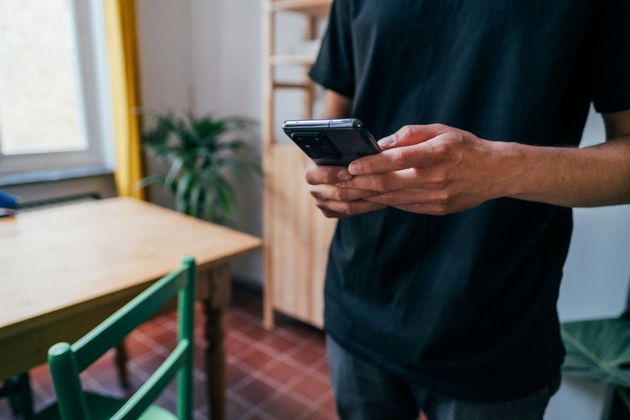 Patient using mobile phone