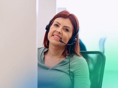 Person working in customer services, on the phone