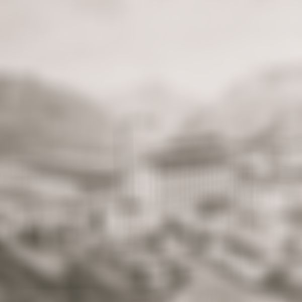 A vintage illustration depicts a large industrial complex with smoking chimneys, set against a backdrop of mountains and forests.