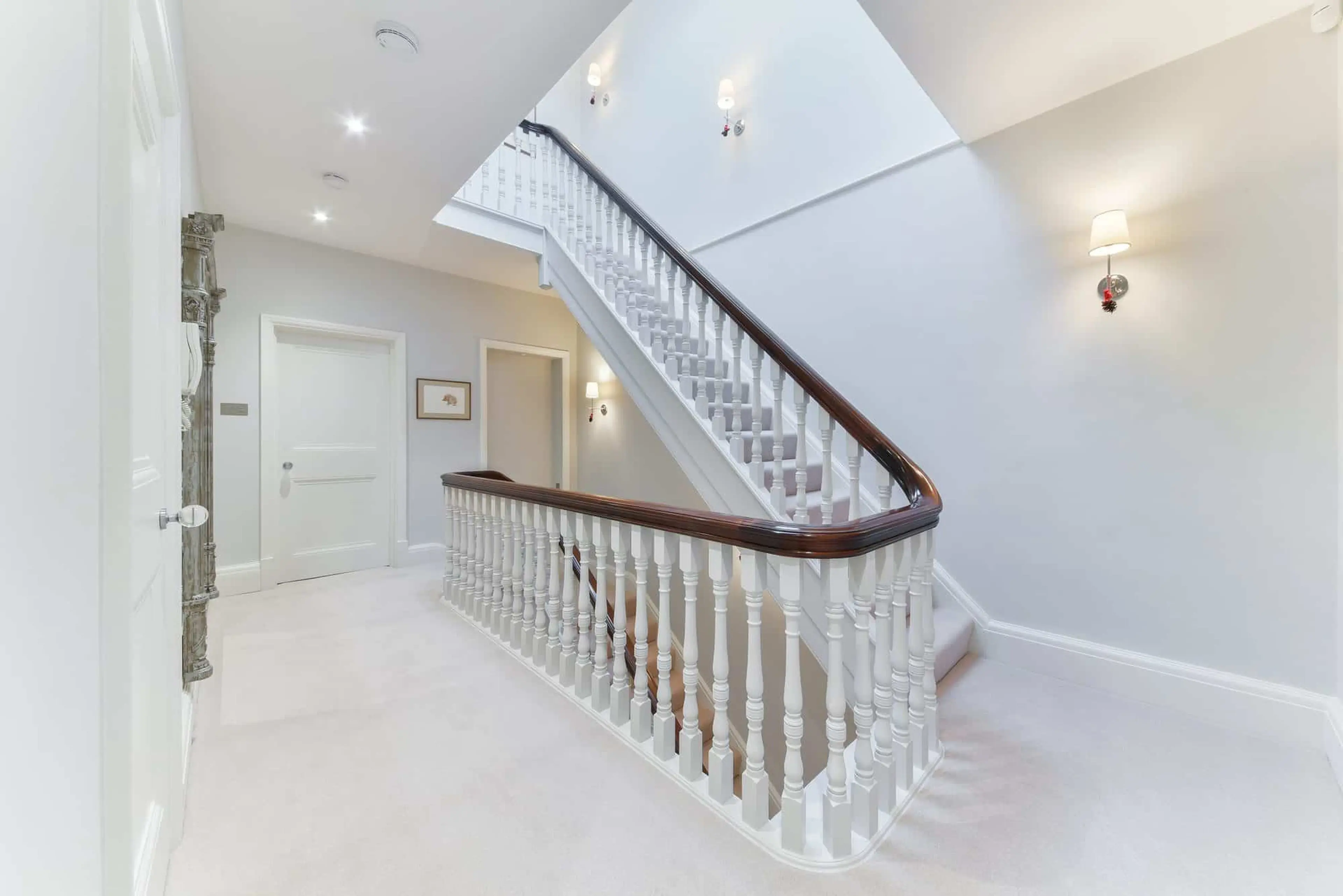Staircase and landing with turned spindles and hardwood handrail