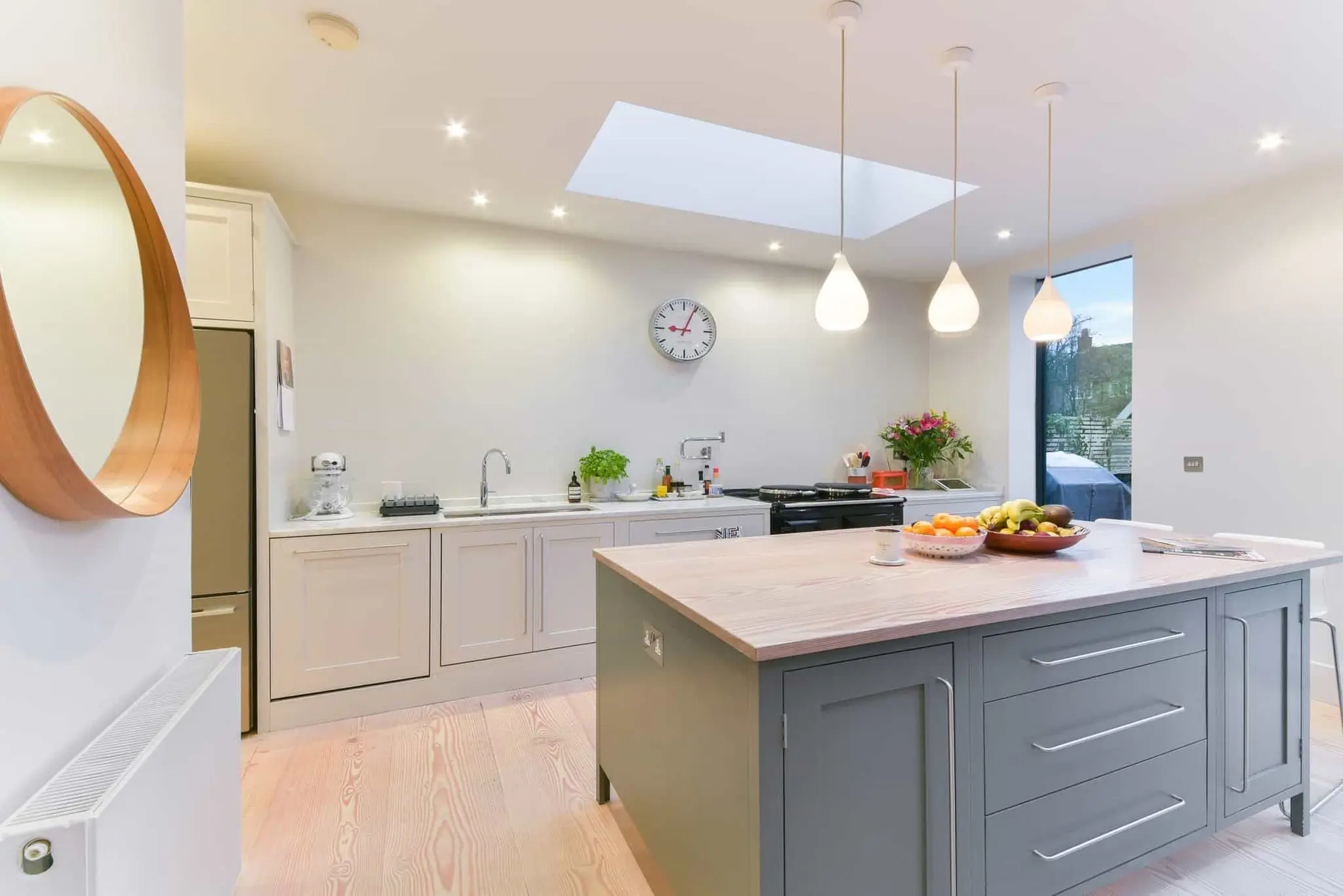 Kitchen run with marble worktop, AGA and solid timber island top