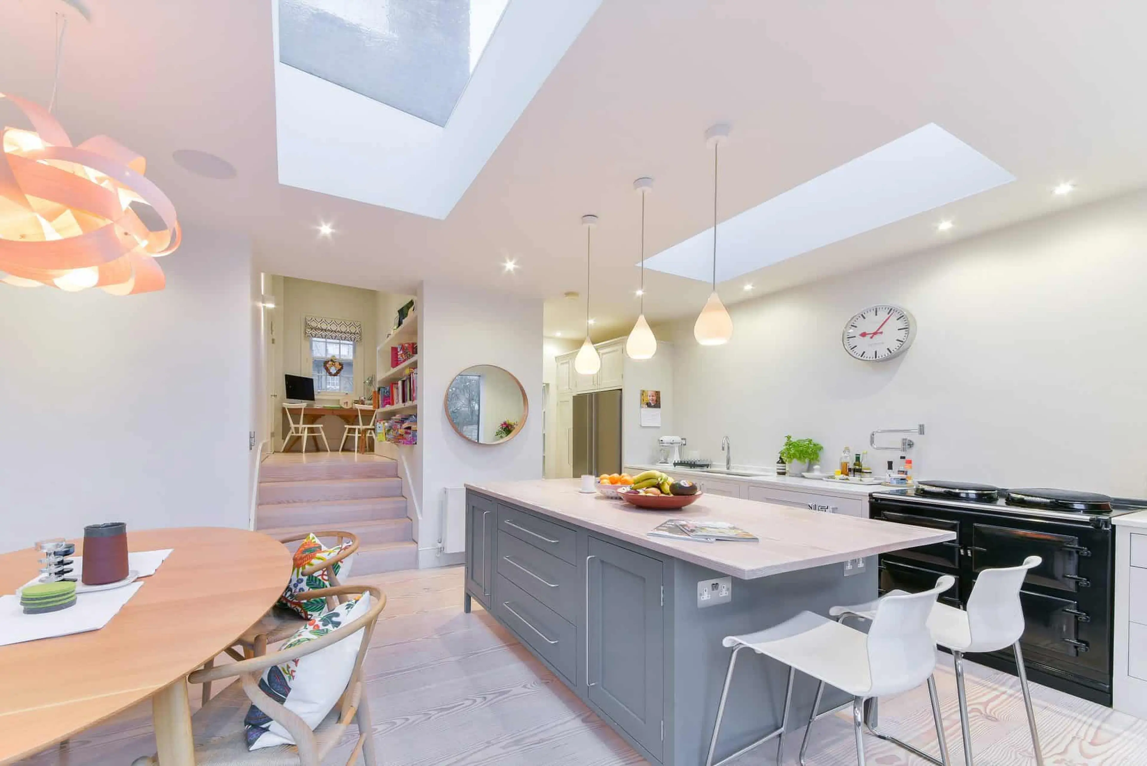 Kitchen and dining room, wide view with steps up to the study