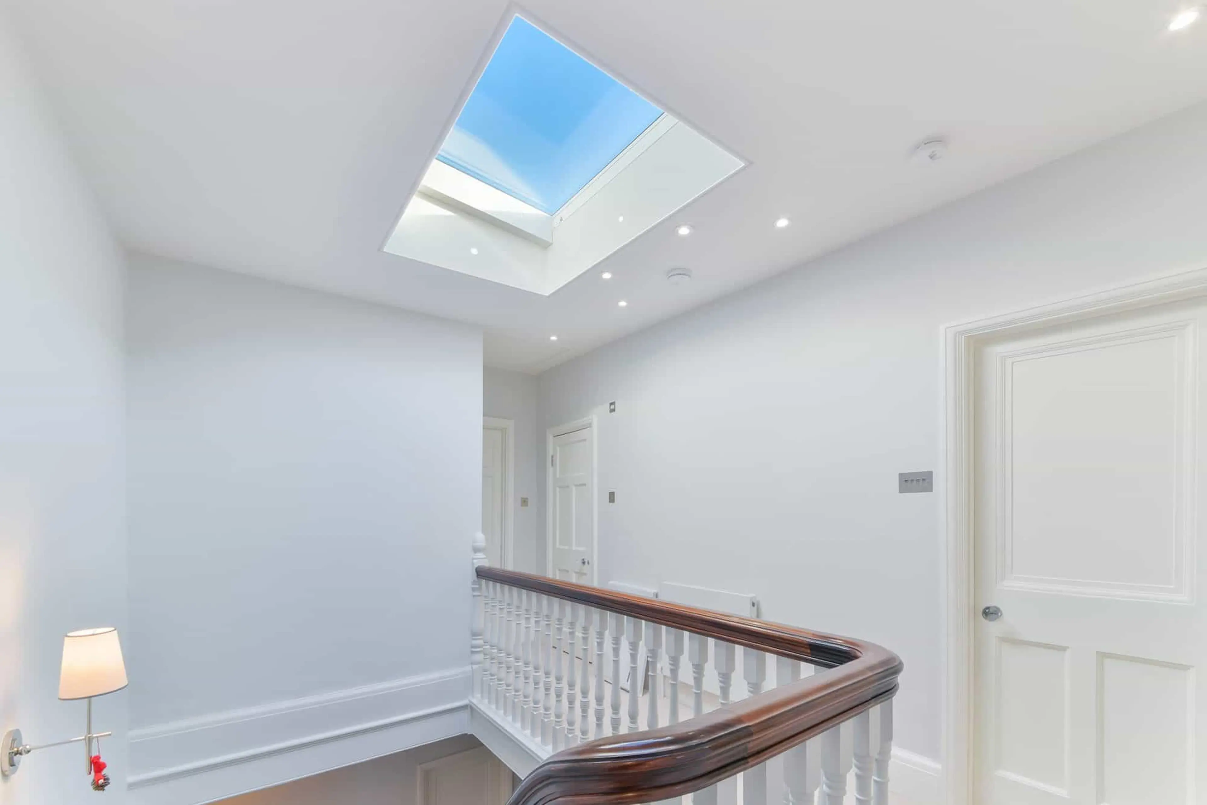 Landing and staircase beneath a roof light