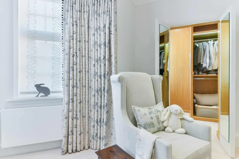 Walk-in wardrobe seen from the bedroom
