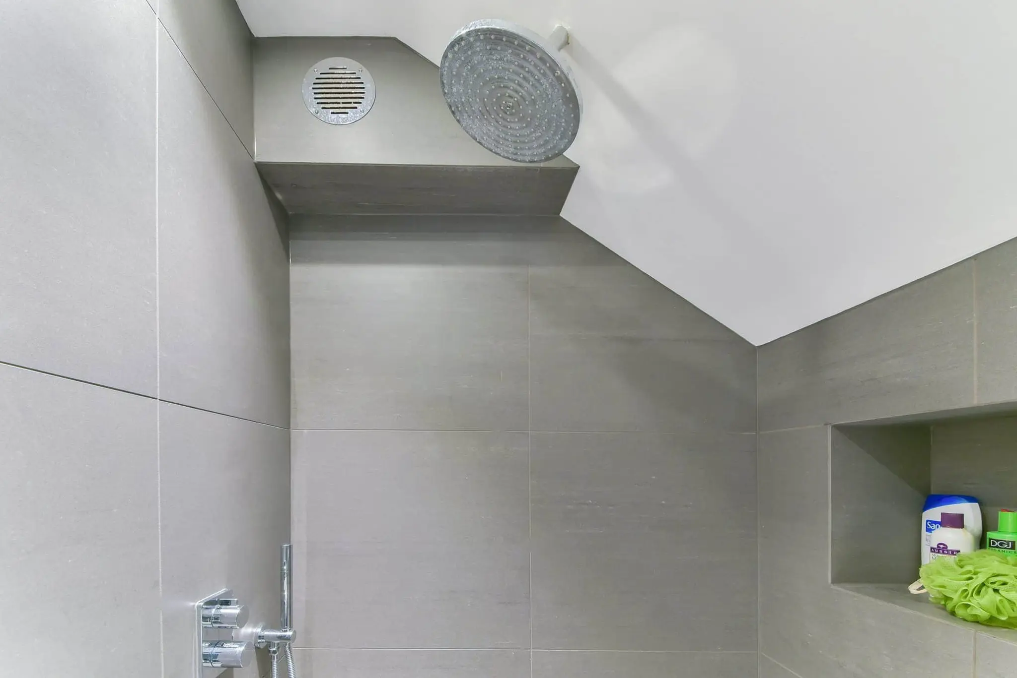 Fully tiled wet room with rainfall shower head