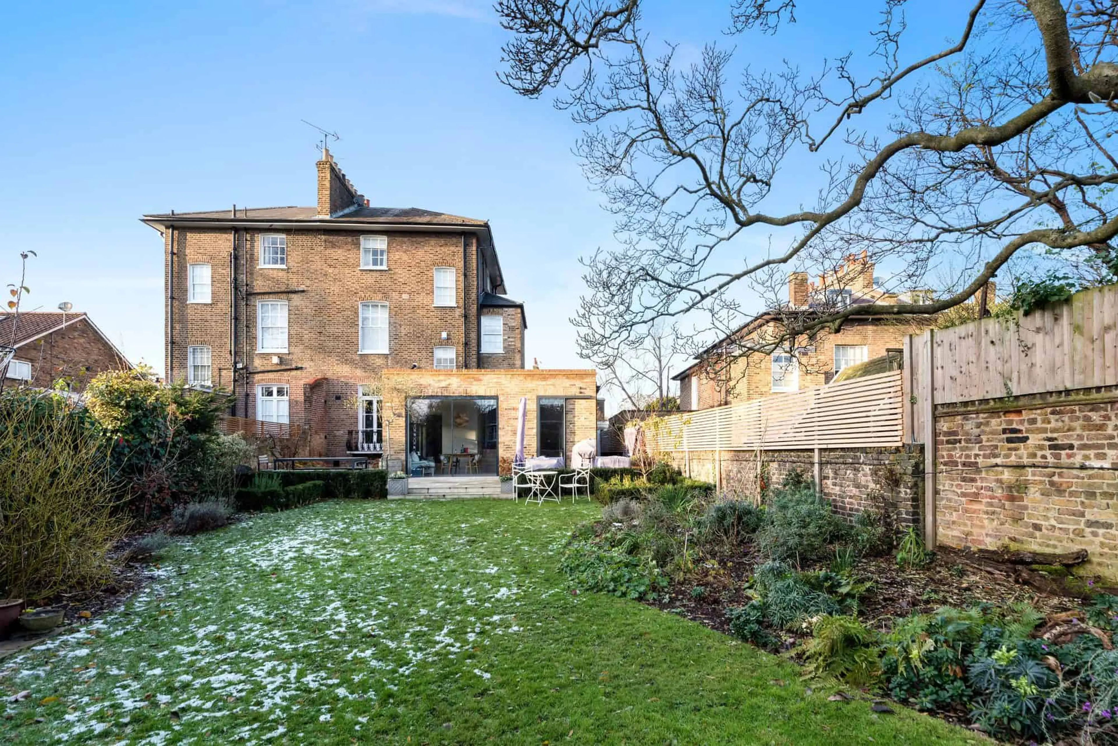 Rear elevation and garden seen from the far end of the plot