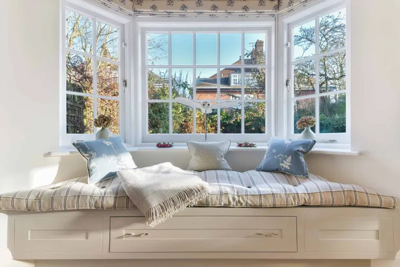 Bay window seat with drawer storage beneath