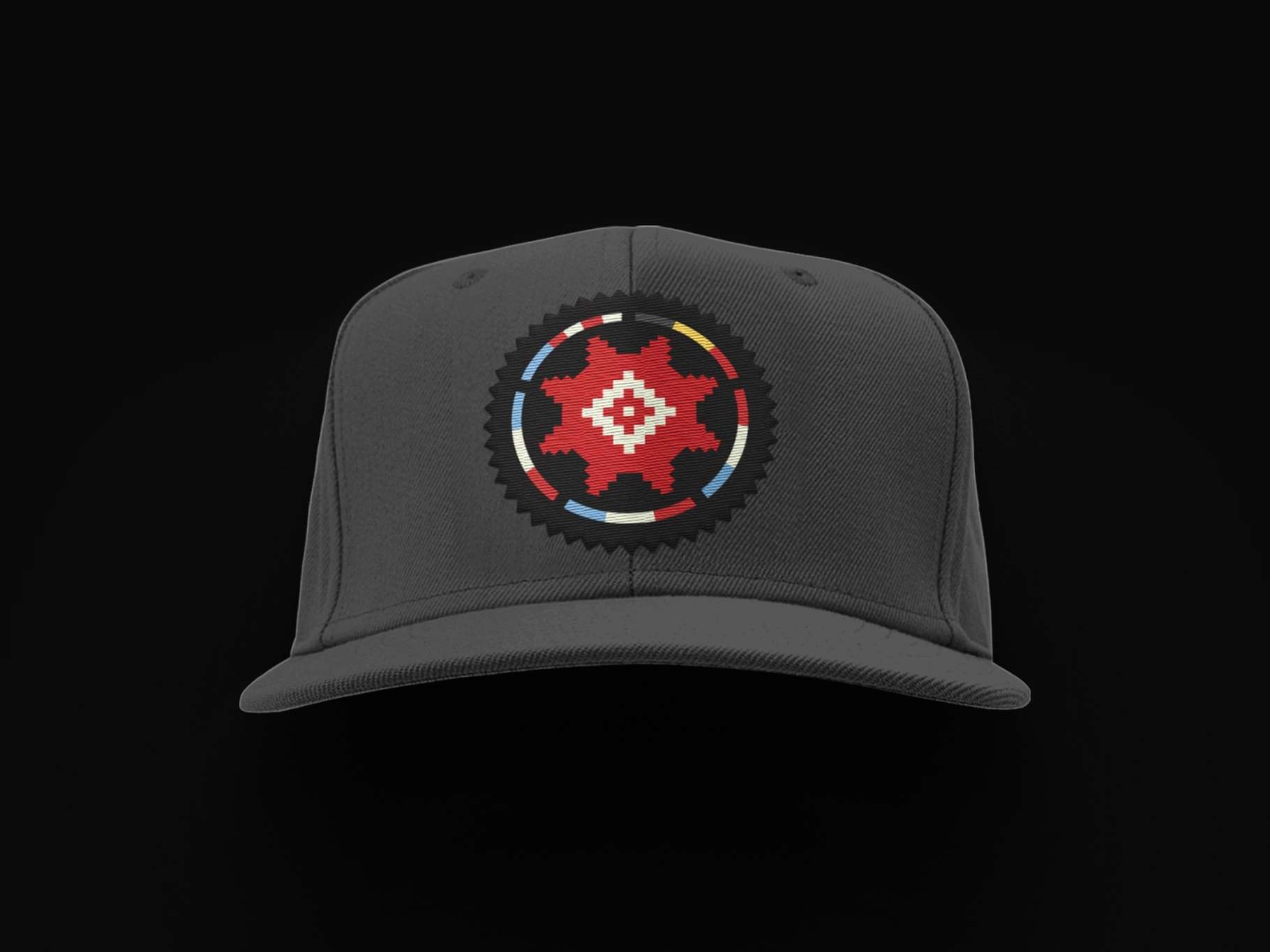 Brand application showcase displaying a round embroidered pixel-style logo patch applied to a structural flat-brim baseball cap template.