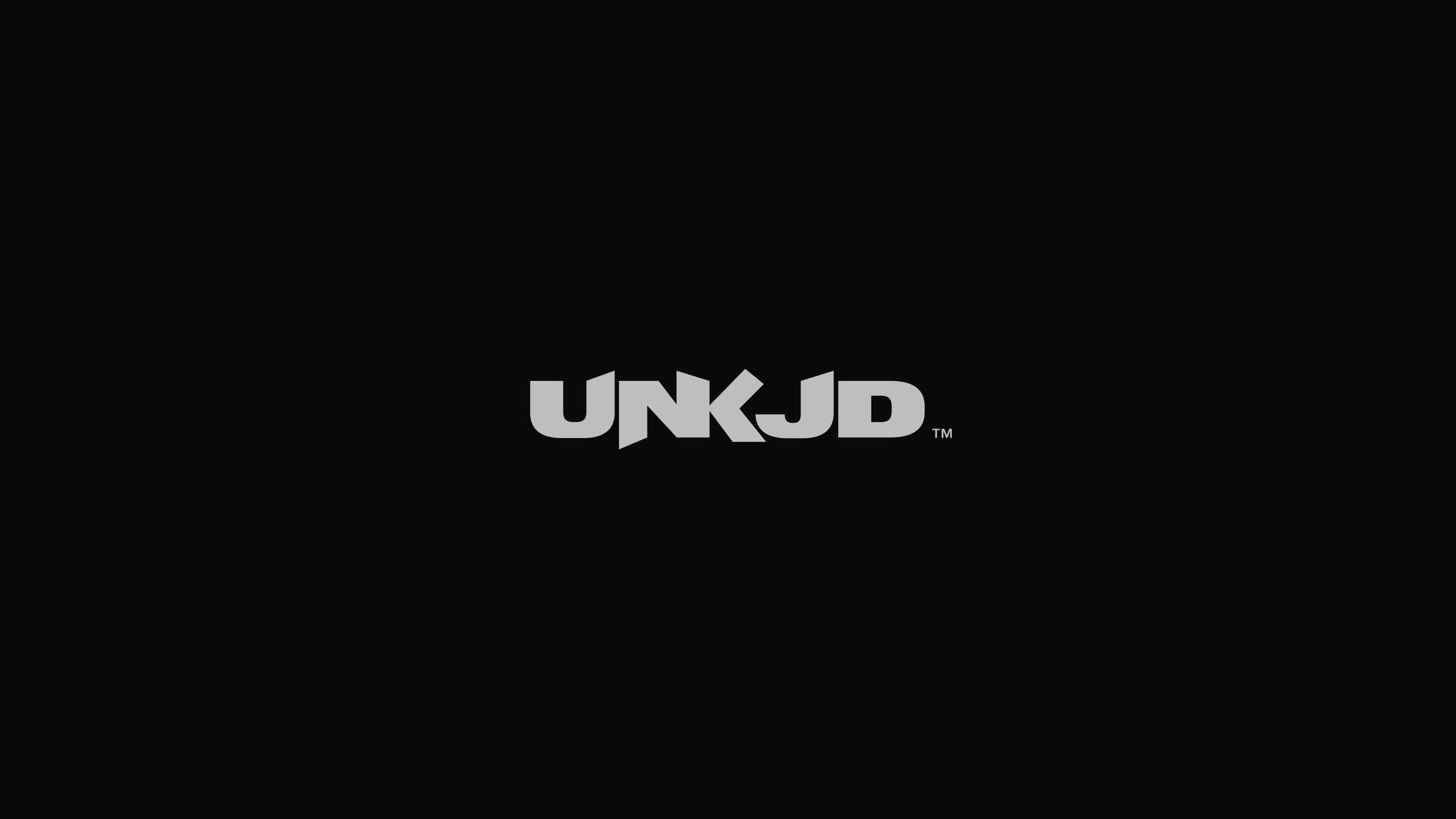 Custom vector wordmark design showing bold, interconnected geometric typography with a unique negative space arrow interaction on a solid black canvas.