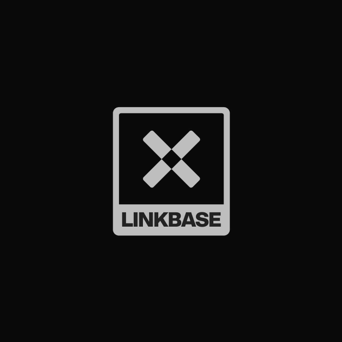 Minimalist tech identity emblem featuring an geometric cross symbol and uppercase wordmark enclosed within a structured stamp frame template.