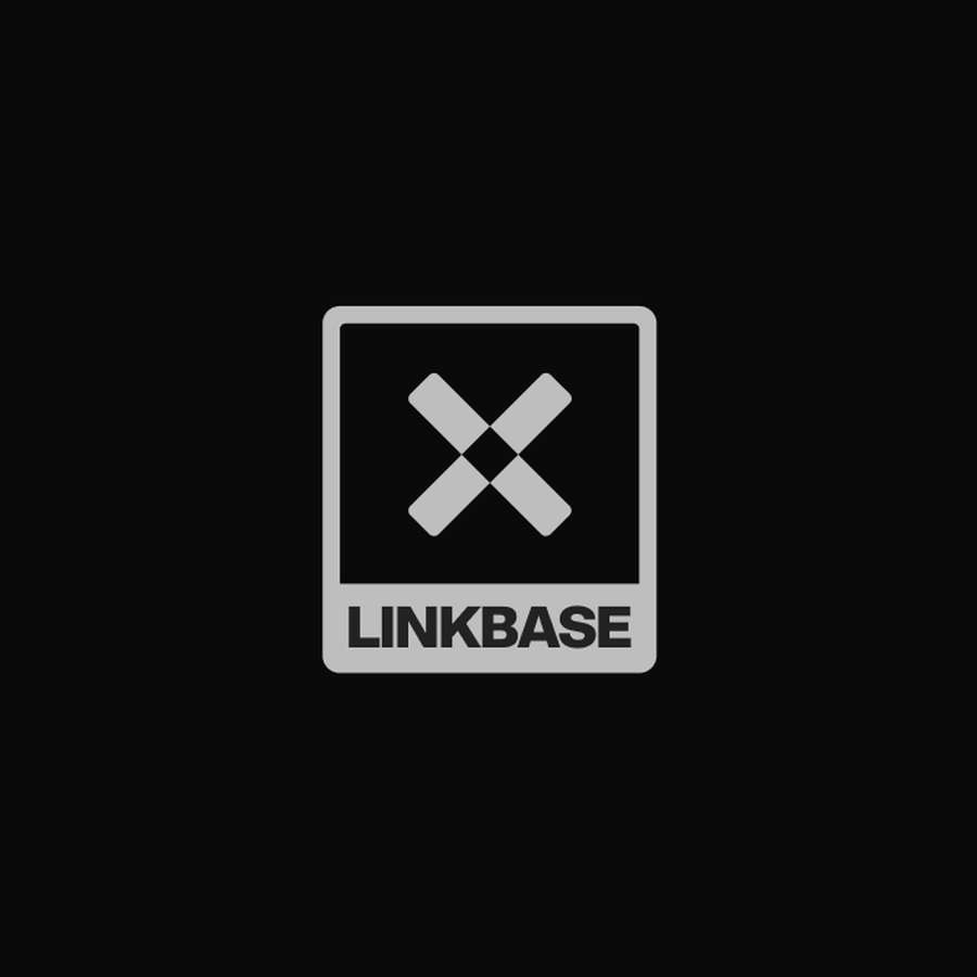 Minimalist tech identity emblem featuring an geometric cross symbol and uppercase wordmark enclosed within a structured stamp frame template.