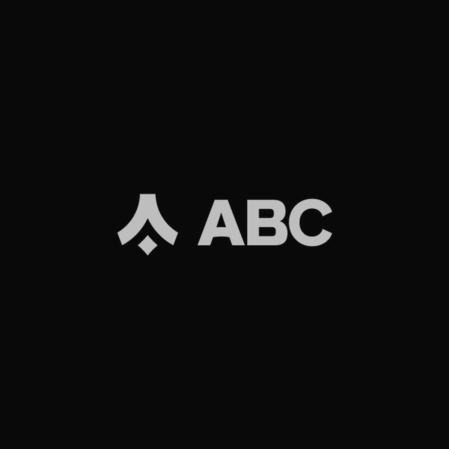 Horizontal logo iteration layout showing a geometric icon component paired alongside primary block text for a clean corporate look.