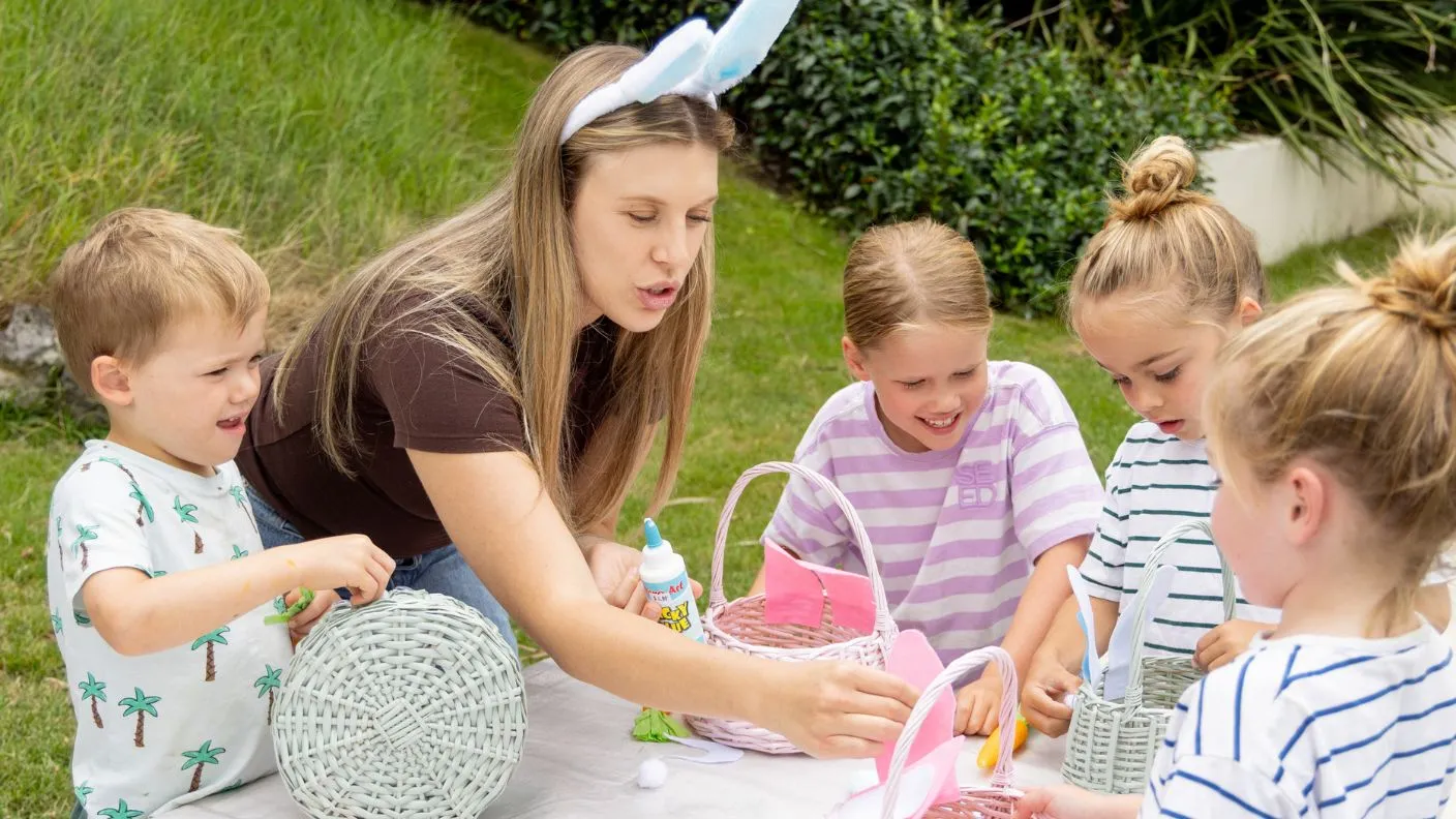 Group of kids decorating Easter baskets painted in White Knight Squirts
