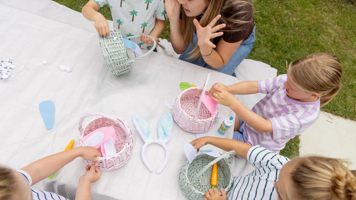 Group of kids decorating Easter baskets painted in White Knight Squirts