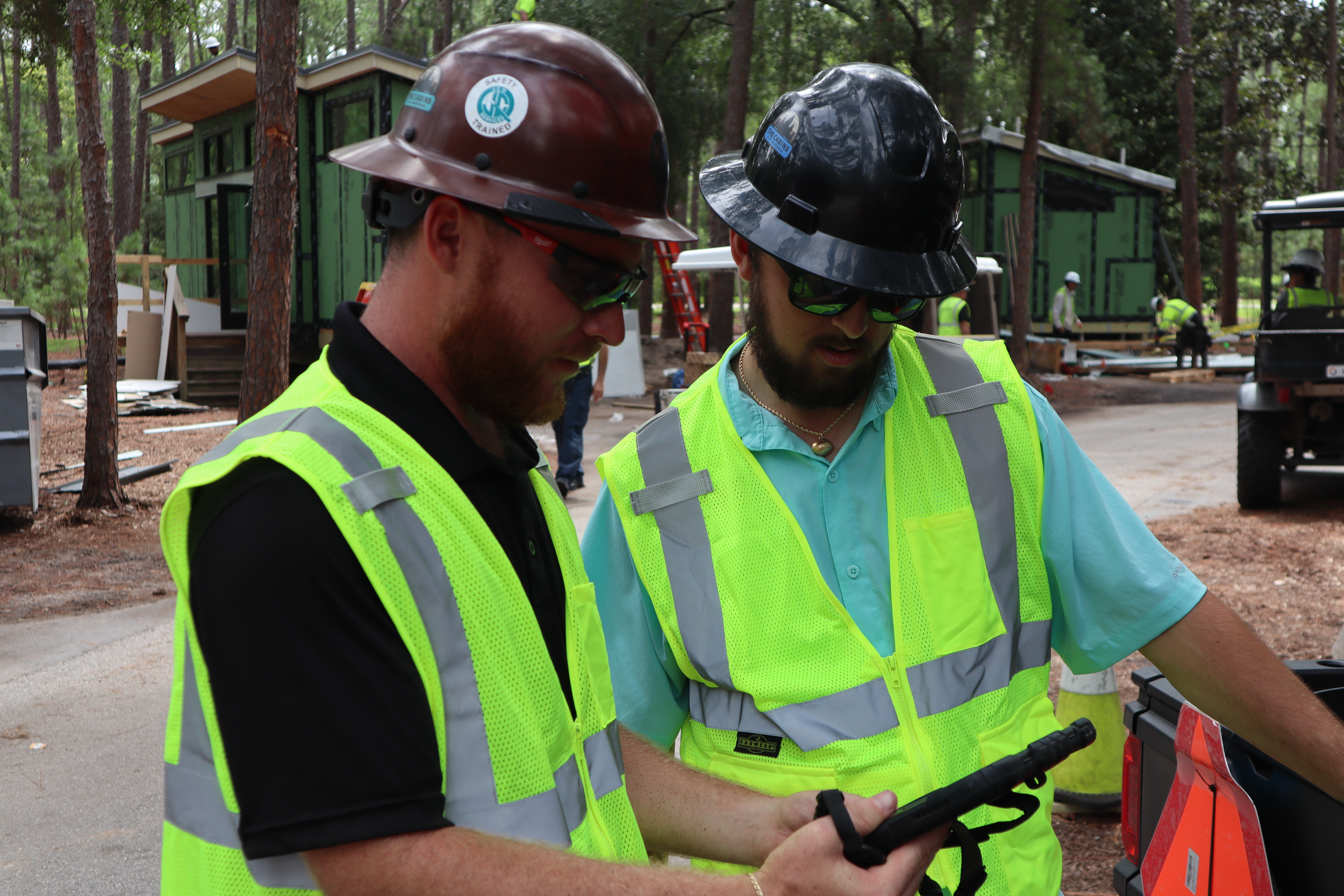 Construction trade partners collaborating on an active project