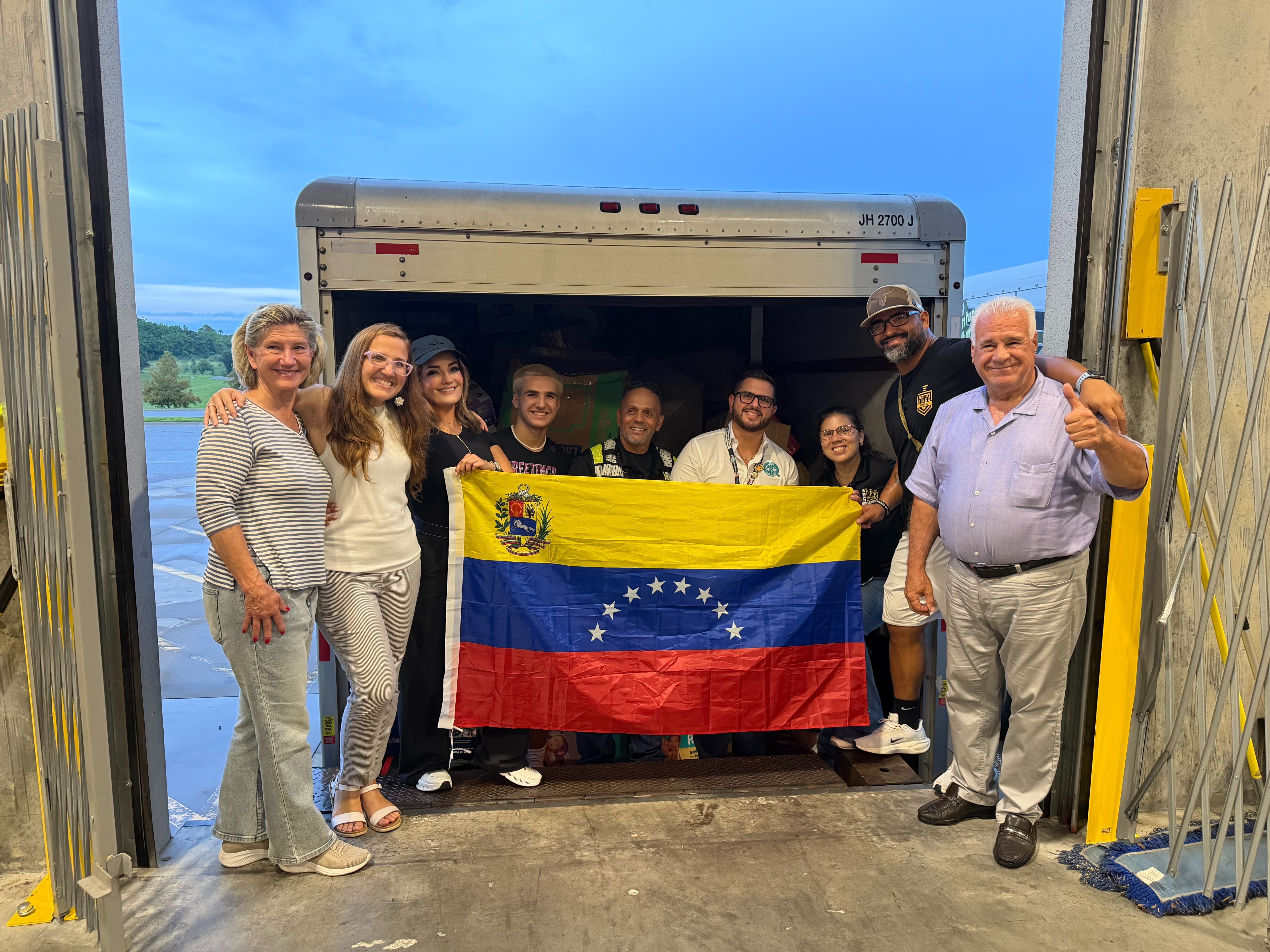 JCQ team members help load trucks for Venezuela Earthquake victims