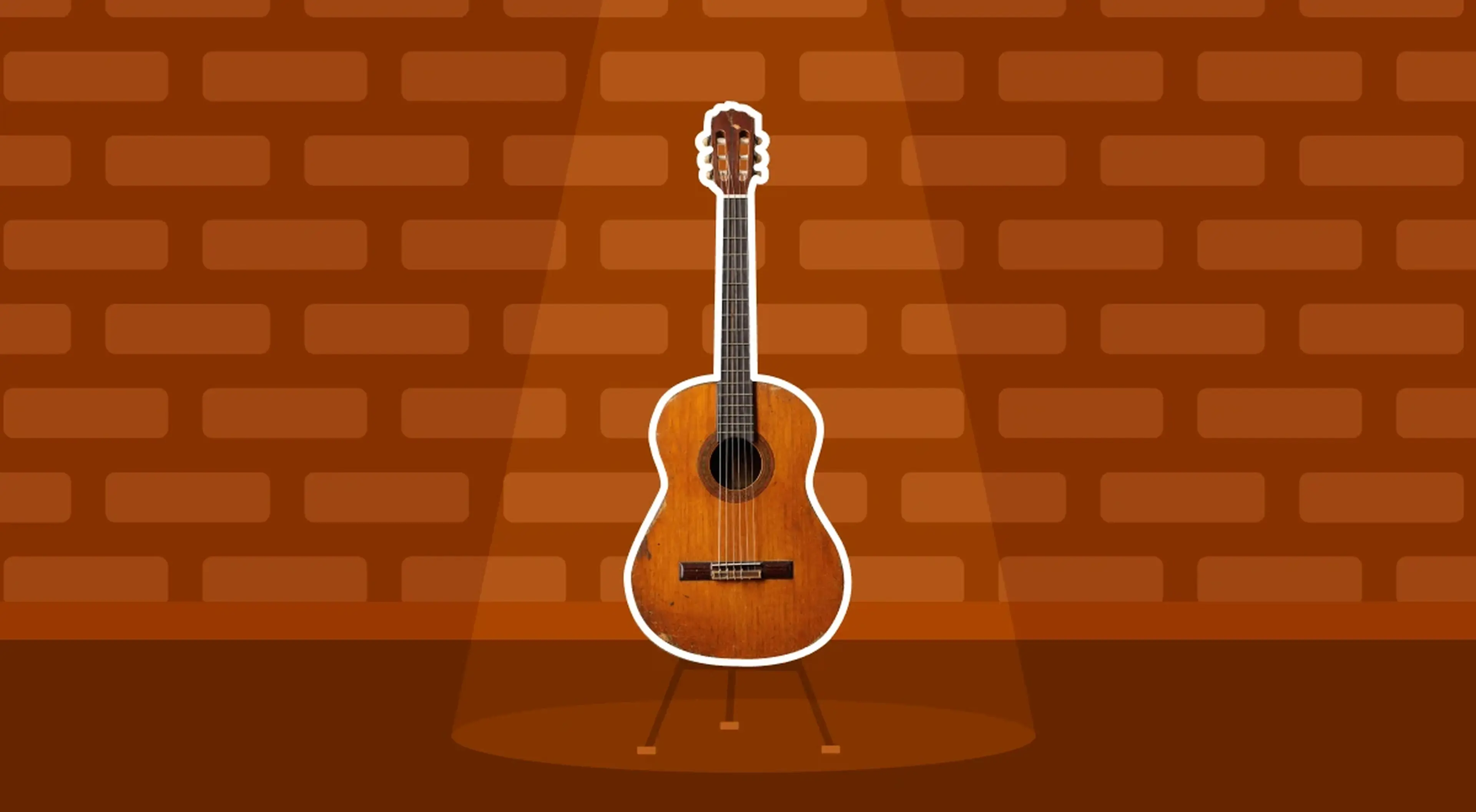 Acoustic guitar on a stand under a spotlight against a red brick wall background, symbolizing learning a new skill through deliberate practice