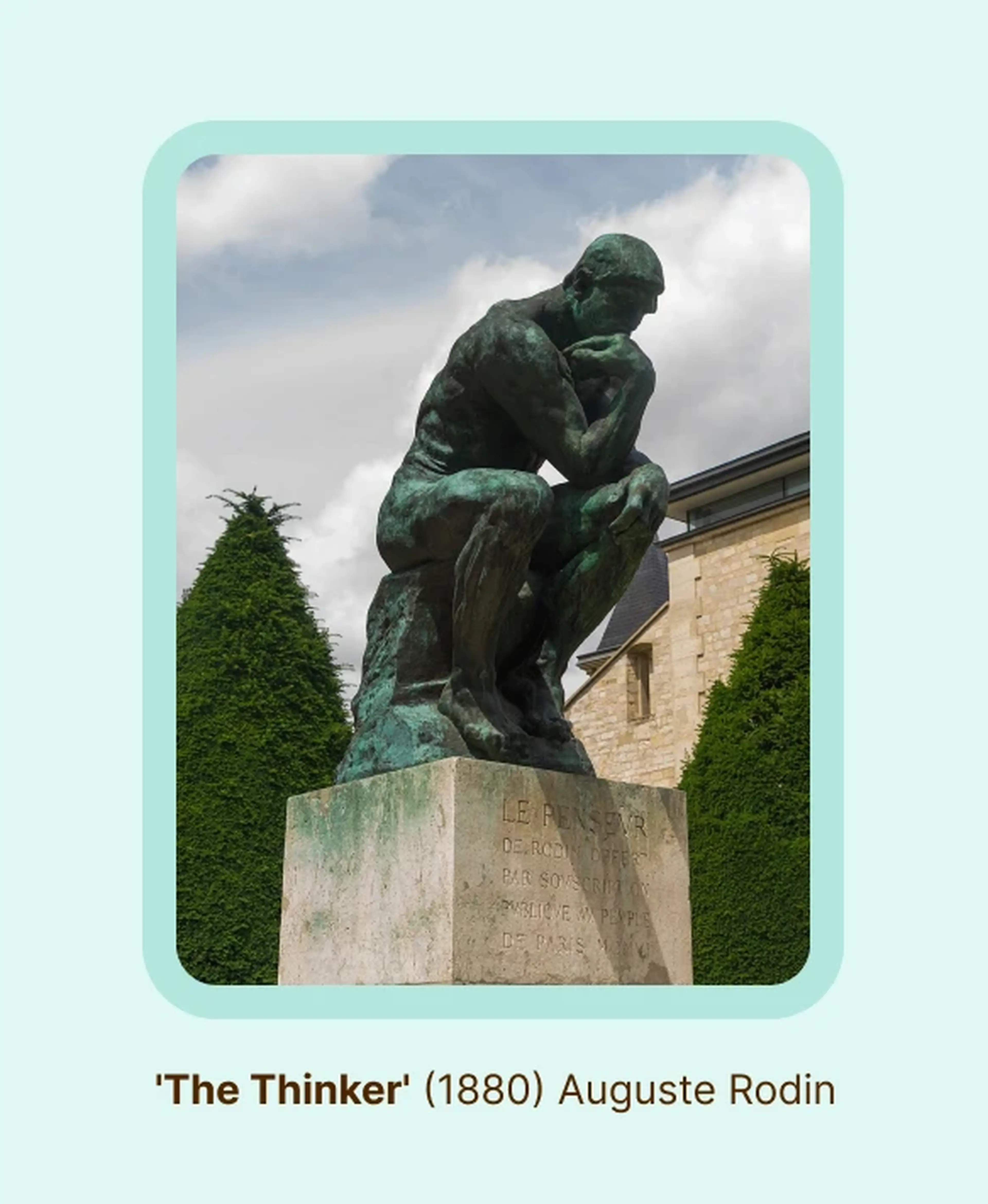 Auguste Rodin's The Thinker, a globally famous sculpture, showing a bronze seated man resting his chin on his hand in deep contemplation surrounded by green trees