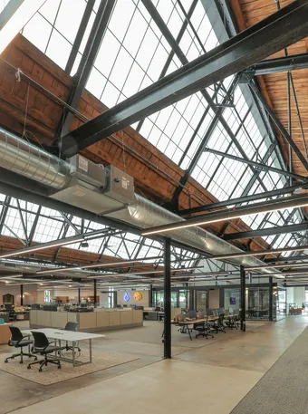 GridSpan FRP panel skylight in adaptive reuse space converted from warehouse to office