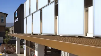 PentaClad™ polycarbonate cladding system used on parking garage transit station