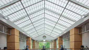 GridSpan FRP skylight over student center workout area
