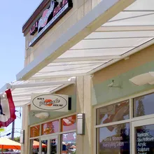 LiteBrow™ Suspended Canopy System over Shopping Center Entryway